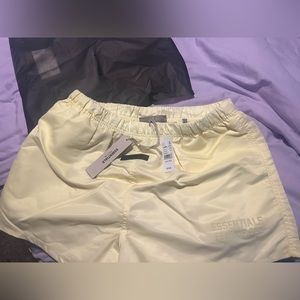 Essentials Fear of god running shorts